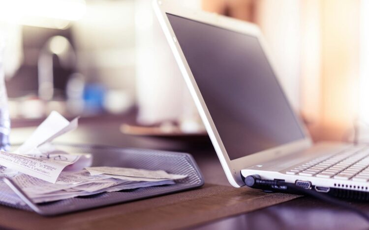 Australian tax return 2026 desk scene with laptop and receipts — Melbourne accountant