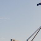 Australian flag flying over Parliament House in Canberra during the 2026 Federal Budget