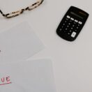 Envelopes marked paid and due beside a calculator, representing a PAYG instalment notice due 28 October 2026, Wiselink Accountants Melbourne and Brisbane