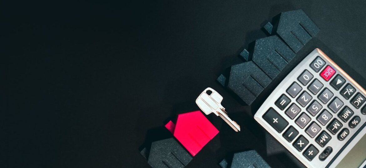 Model houses, a key and a calculator: Australian capital gains tax on selling property overseas, Wiselink Accountants