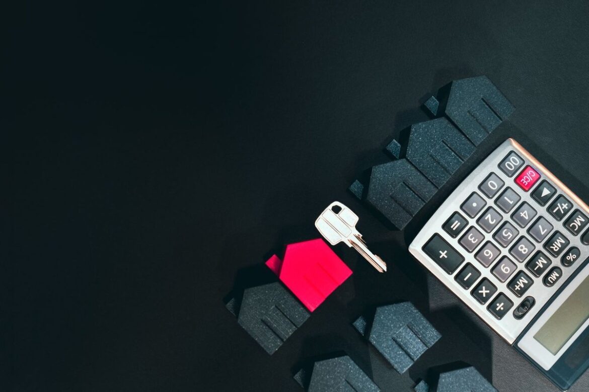 Model houses, a key and a calculator: Australian capital gains tax on selling property overseas, Wiselink Accountants