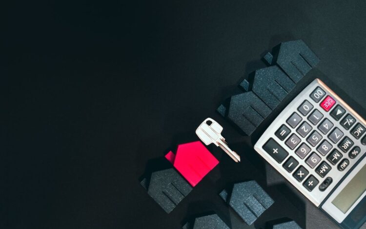 Model houses, a key and a calculator: Australian capital gains tax on selling property overseas, Wiselink Accountants